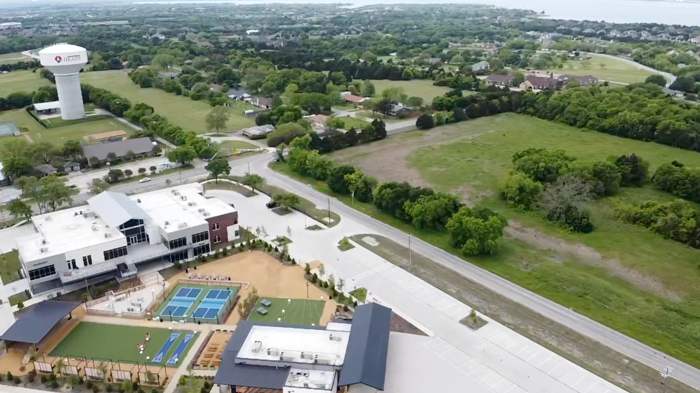 Aerial view of homes and green space in Heath, TX