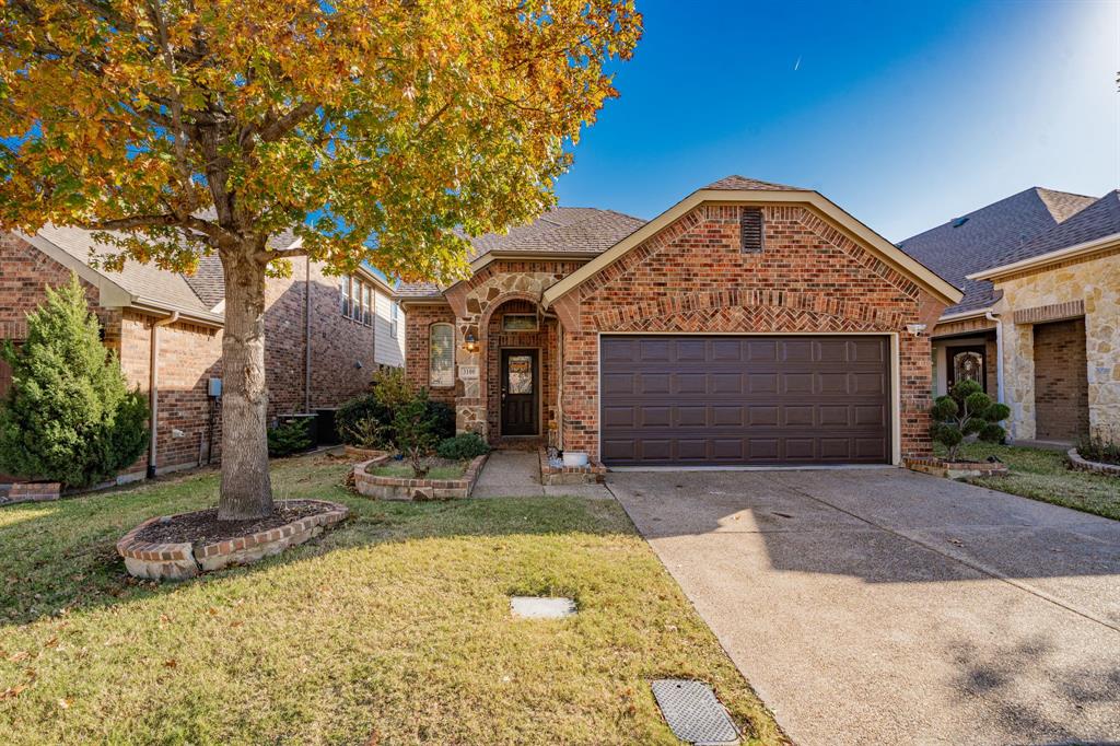 Brick home with a two-car garage in the Rockwall County area